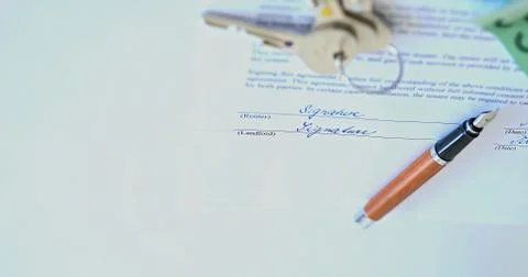Closeup of signed contract. Stock Photos
