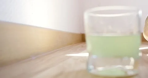 Closeup silicone to baseboards Sealant application between plinths and wall How Stock Footage 246554371