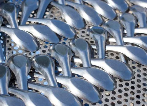 Closeup of silver spoons Stock Photos