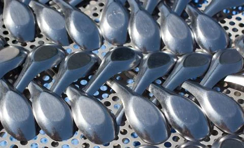 Closeup of silver spoons Stock Photos