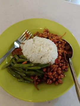 Closeup of simple dish and side dishes on the table Stock Photos