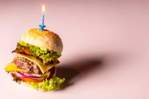 Closeup of a single cheeseburger Stock Photos