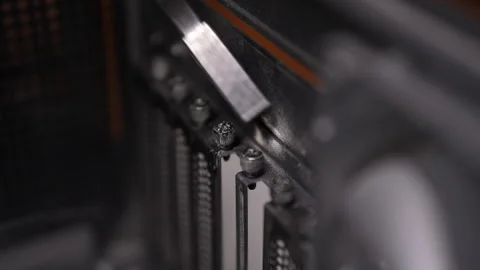 Closeup of skilled computer technician cleaning dusty computer case, focusing on Stock Footage 291272836