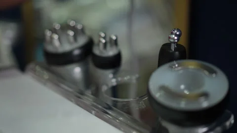 Closeup of skincare applicator selection under clinical lighting Stock Footage 326064651