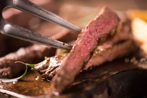 Closeup of a slice of beef steak. Stock Photos