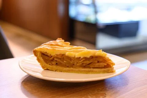 Closeup of a slice of cinnamon apple pie on a plate. Stock Photos