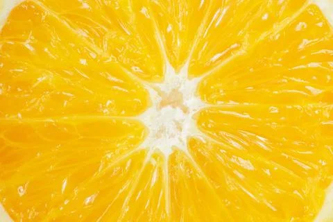 Closeup slice of fresh orange. Stock Photos