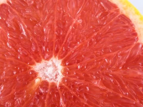 Closeup of slice of grapefruit Stock Photos