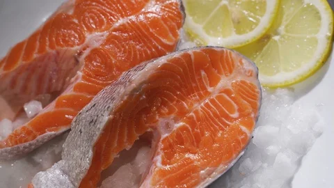 Closeup of slice of red fish on ice in the fish market Stock Footage 123228171