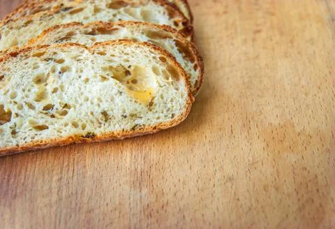 Closeup of sliced bread on a chopping board Stock Photos