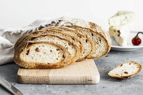 Closeup of slices of wheat loaf a table Stock Photos