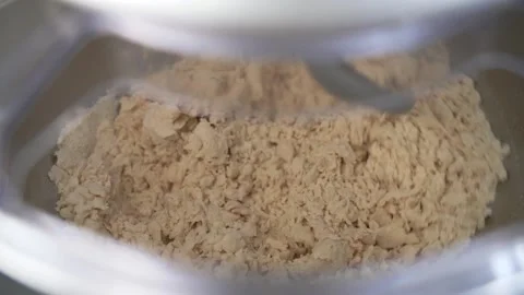 Closeup slow motion of kneading machine and dough for homemade bread and pizza Stock Footage 215920286