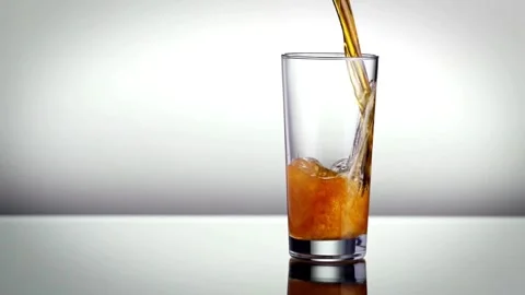 Closeup slow-motion pouring beer in glass. Craft beer closeup. Microbrewery Stock Footage 265767390