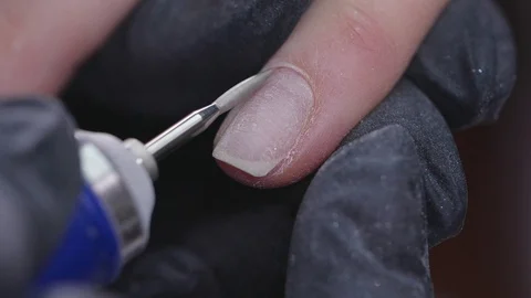 Closeup slow motion shot of hardware manicure in a beauty salon Stock Footage 128220416