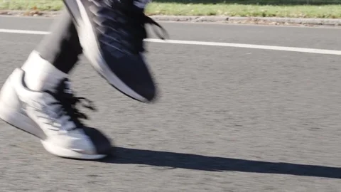 Closeup slow motion shot of a man running Stock Footage 70381877