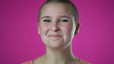 Closeup slow motion of smiling young gender fluid woman 20s years old posing Stock Footage 223698847