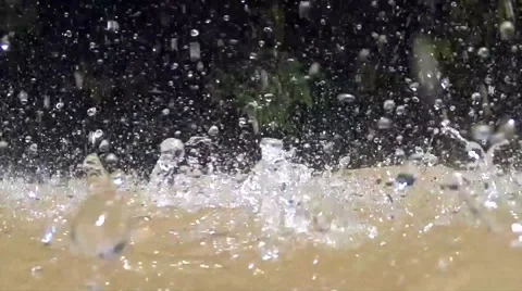 Closeup slow motion spring water falling into river Stock Footage 49471988