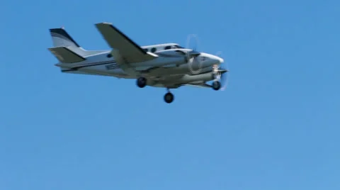Closeup of a small airplane flying by-audio incl Video stock 34716392