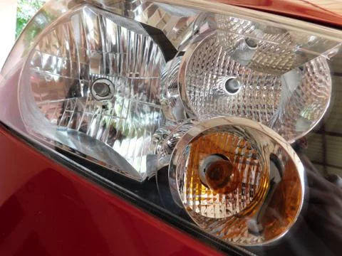 Closeup of small bulb fixed inside of the car light set Stock Photos