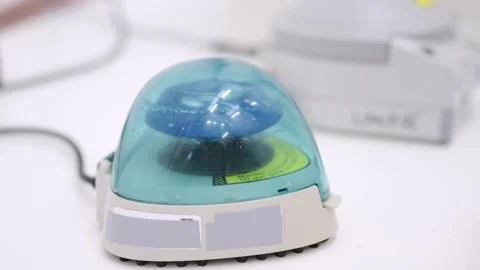 Closeup of small centrifuge machine Stock Footage 255196129