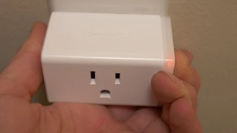 Closeup on a Smart Plug Being used in a Connected House Video stock 121692818