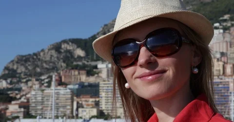 Closeup Smiling Woman Portrait Looking Camera Girl with Hat Sunglasses In Monaco Stock Footage 72786341
