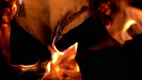 Closeup of smoldering fire. Flames burning heating building Stock Footage 173457606