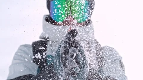 Closeup of Snowboarder Clapping his Hands with Powder Snow. Stock Footage 300809593