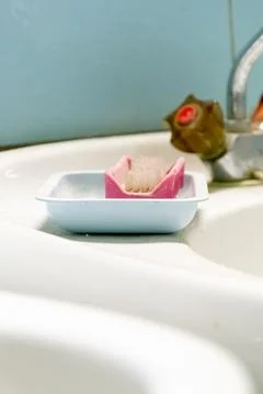 Closeup of a soap container with the blurred background Stock Photos
