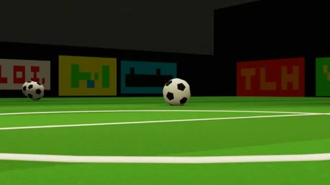 Closeup the soccer balls is spinning forward on the stadium floor. Stock Footage 151130245