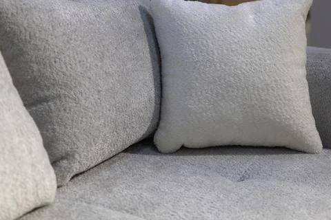 Closeup of sofa with cushions Stock Photos