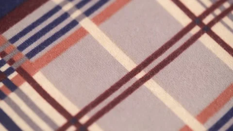 Closeup of soft fabric with checkered stripe pattern. macro shooting. rotation. Stock Footage 241927419