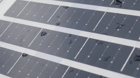 Closeup solar panel surface with water rain droplets Видео 335069355