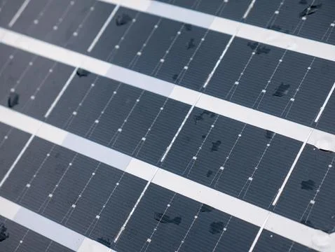 Closeup solar panel surface with water rain droplets showing photovoltaic c.. Stock Photos
