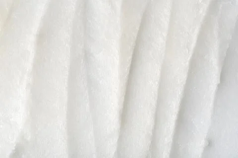 Closeup of solid white coconut oil with rich, creamy texture. Natural organic Stock Photos