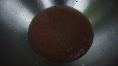 Closeup of some water in a pot shaking from the shock Vidéo 170017711