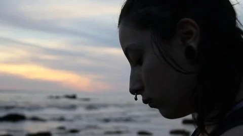 Closeup of someone watching the waves Stock Footage 83247117