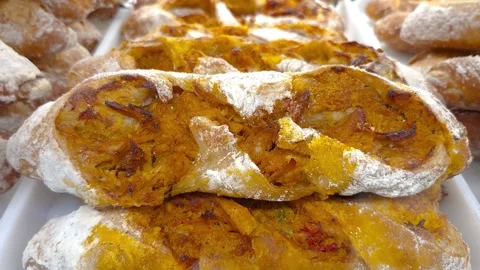 Closeup of sourdough bread with shredded pork in a bakery window. Stock Footage 335704077