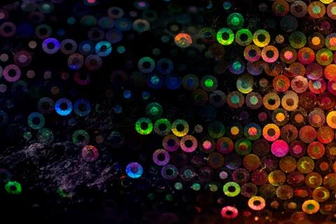 Closeup of sparkly background with disk-shaped pattern design Stock Photos