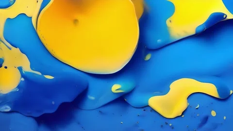 Closeup of a speckled plastic surface in shades of sunny yellow and electric Stock Footage 253932257