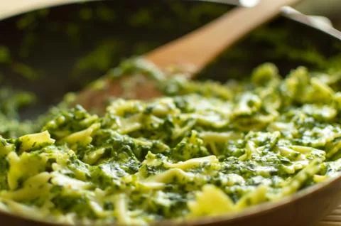 Closeup spinach dish in pan Stock Photos