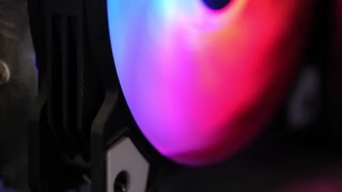 Closeup of spinning neon computer fan Stock Footage 321951773