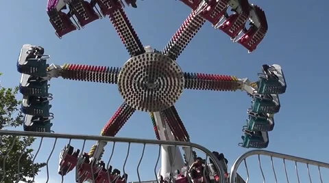 Closeup Of Spinning Ride On An Articulated Arm