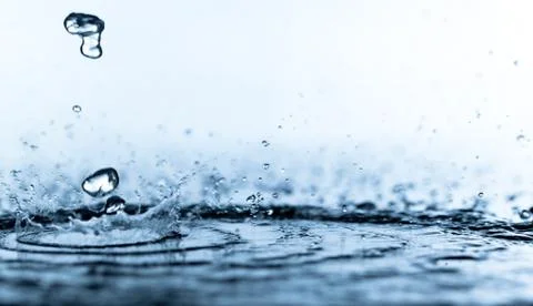 Closeup of splash of water on light background Stock-Fotos