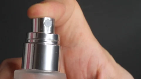 Closeup of spraying perfume or thermal water glass bottle 스톡 동영상 119232012