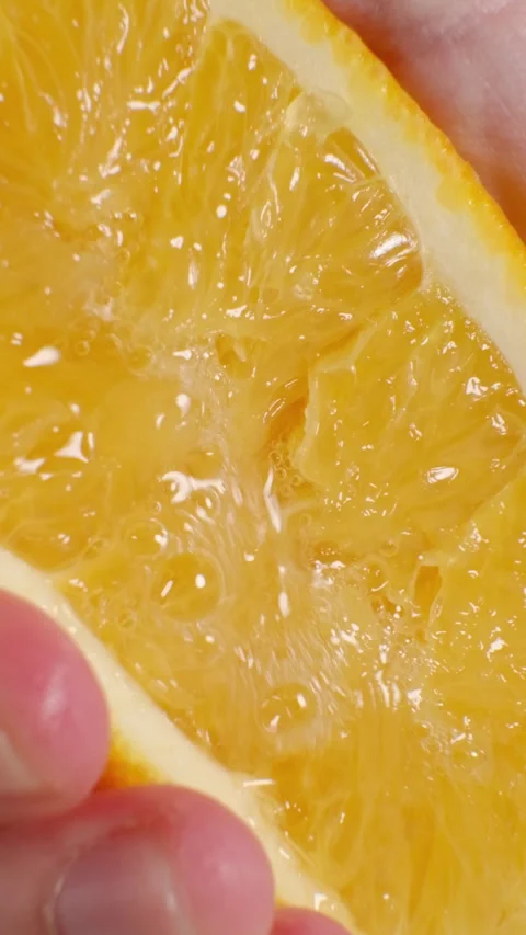 Closeup of a Squeezed Orange Half Stock Footage 302507710