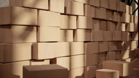 Closeup stack of cardboard logistics shipping boxes in warehouse.  Stock Footage 336761994
