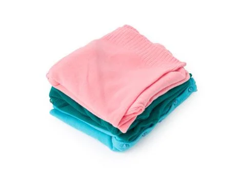 Closeup stack of clothes knitting sweater on white background Stock Photos