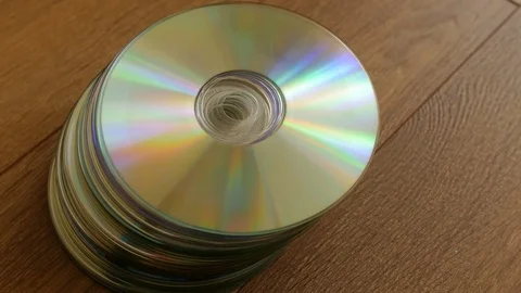 Closeup of a stack compact discs Stock Footage 74411735
