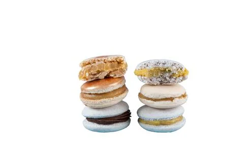 Closeup of a stack of macarons filled with chocolate ganache, dulce de leche  Stock Photos